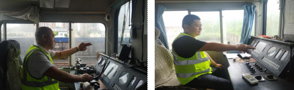 司机李建正在确认进路和信号 副司机张鹏进行接班后对各仪表检查.png